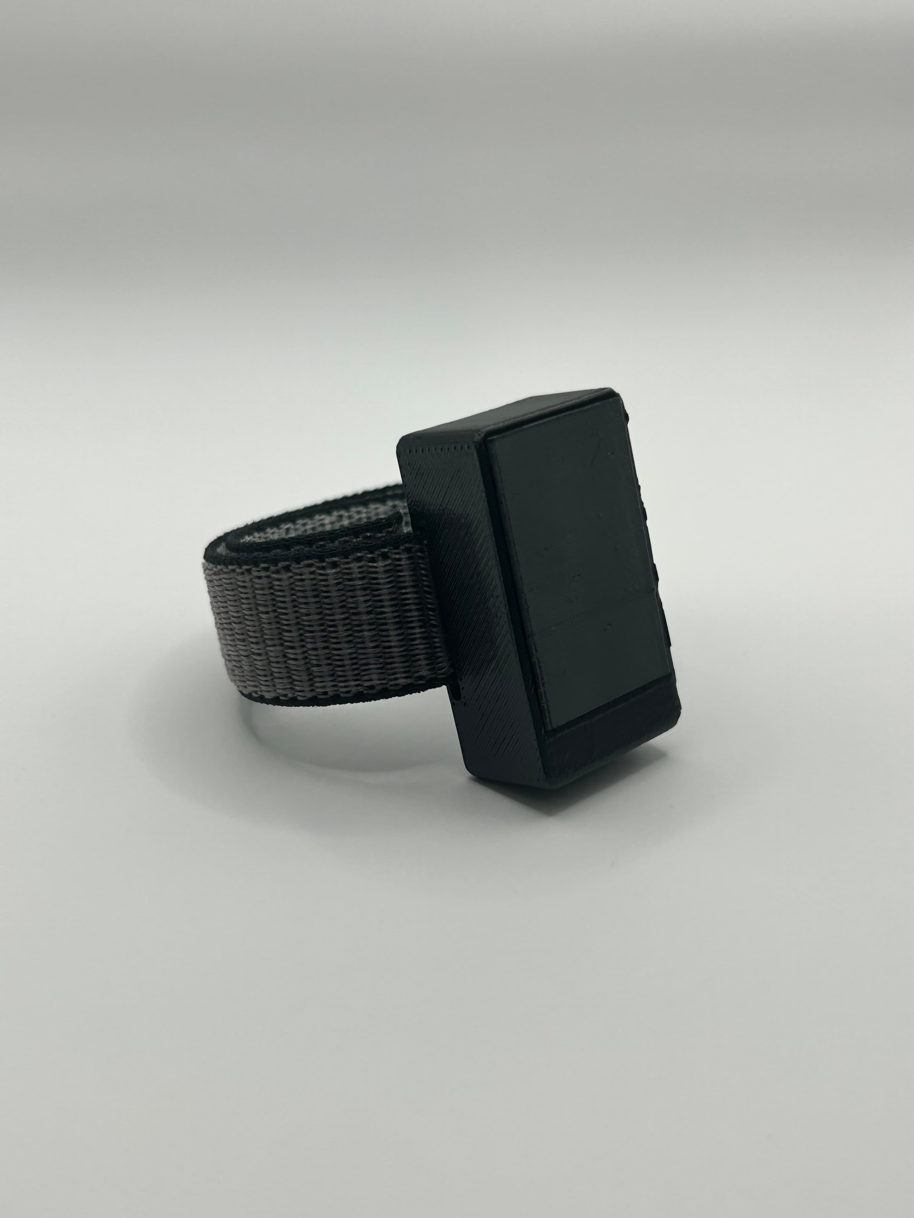 ShockUp Band ONE with a grey woven strap, front view